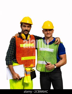 Two male construction workers or engineers stood and hugged each other. Isolated on white background Stock Photo