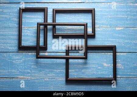 Picture Frames on Wooden Background Stock Photo