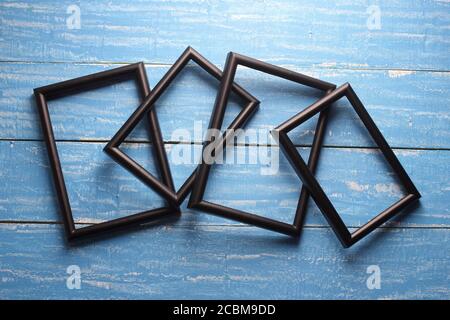 Picture Frames on Wooden Background Stock Photo