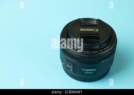 Moscow, Russia - 1 June 2020: Canon EF EOS 50 mm lens with copy space background , Illustrative Editorial Stock Photo