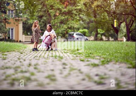 Mom and daughter getting ready for the school Stock Photo