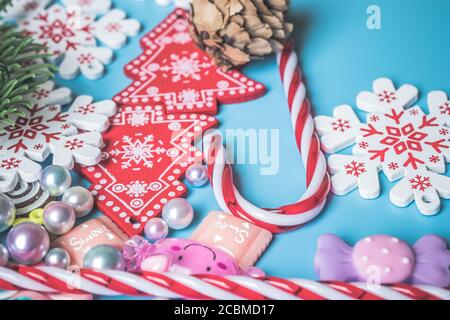 Flat lay of Christmas decoration background. New Year toys on blue background top view Stock Photo