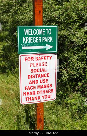 WOODRIDGE, NY, UNITED STATES - Jun 16, 2020: Woodridge, NY / USA - 06/16/2020: Welcome Signs for William Krieger Park in Woodridge NY with New Social Stock Photo