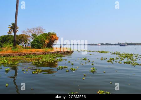 travel, water, nature, landscape, tourism, beautiful, river, sky, summer, boat, blue, vacation, outdoor, green, india, lake, destination, tree, outdoo Stock Photo