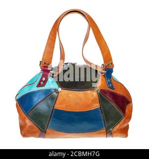 side view of handcrafted patchwork leather travel bag isolated on white background Stock Photo
