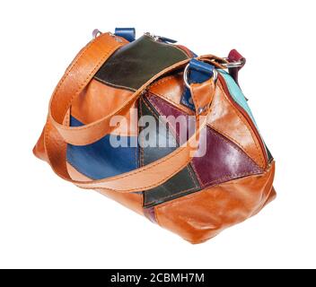 handcrafted patchwork leather travel bag isolated on white background Stock Photo
