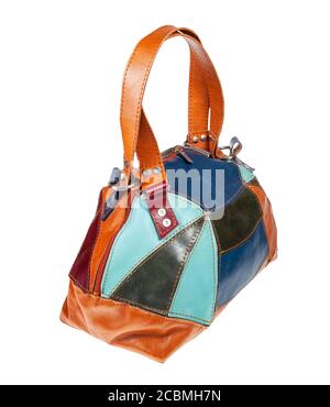 handmade patchwork leather travel bag isolated on white background Stock Photo