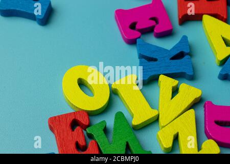 Big letters top view on blue background Stock Photo