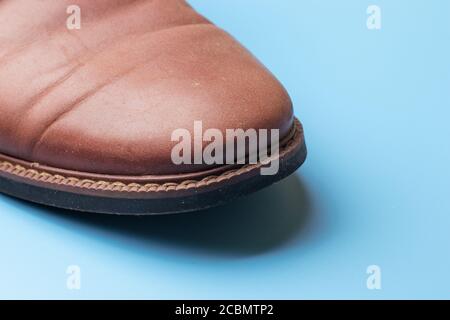 Brown leather shoe close-up with copy space Stock Photo