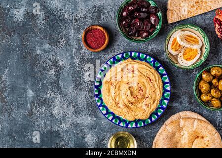 Hummus - traditional dish of Israeli and Middle Eastern cuisine, top view. Stock Photo