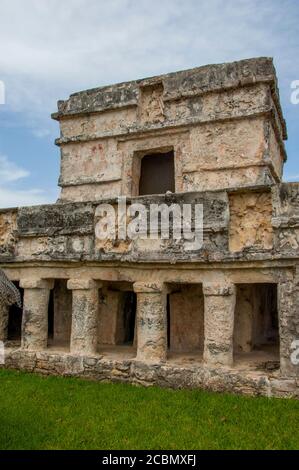 View of the Temple of the Frescos in Tulum, which is the site of a Pre-Columbian Mayan walled city along the east coast of the Yucatan Peninsula on th Stock Photo