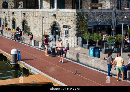 Young people on Broken Dock during Covid 19, Bristol, England. July 2020 Stock Photo