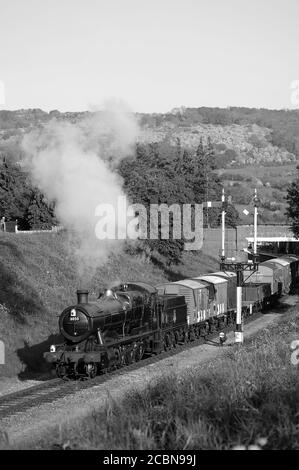 '3850' leaving Winchcombe with a goods train and heading towards Greet Tunnel. Stock Photo