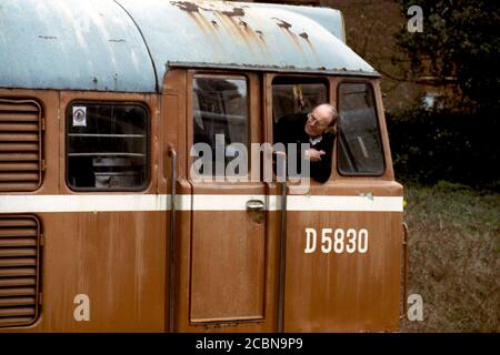 Loughborough, UK - 2018: Old diesel locomotive for tour train on Great Central (Heritage) Railway, a train crew looking back from the cab. Stock Photo