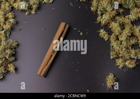 Marijuana with smoking accessories on copy space background. Cannabis  design concept Stock Photo - Alamy