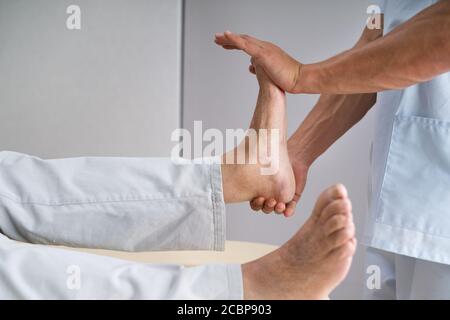 Ankle Injury Rehab. Elderly Senior Feet Rehabilitation Stock Photo