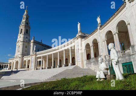 Statues of two little shepherds in front of the Basilica of Our Lady of the Rosary, Fatima, Ourem, Portugal Stock Photo
