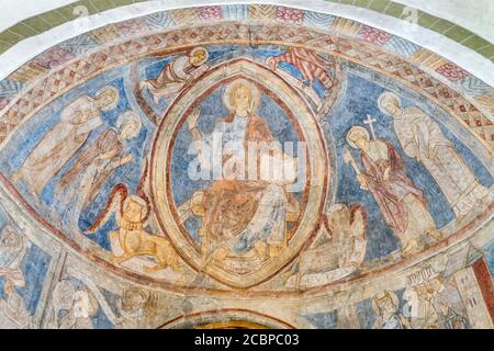 Fresco of Christ Pantocrator in Mandorla, the four living beings of the Apocalypse, on the left Mary and the Evangelist John, on the right Peter and Stock Photo