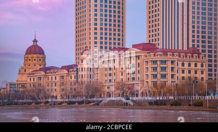 Tianjin, China - Jan 16 2020: Cityscape of Tianjin city with buiding and architecture on the side of Haihe river bank Stock Photo