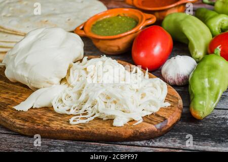 Oaxaca Chesse or queso oaxaca or quesillo is a Mexican fresh white Chesse from Mexico Stock Photo