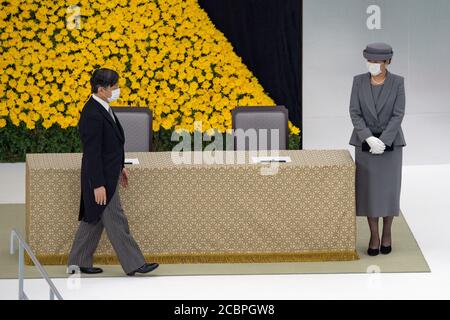 Tokyo, Japan. 15th Aug, 2020. TOKYO, JAPAN - AUGUST 15: Japan's Emperor Naruhito (L) and Empress Masako (R) wearing face masks, depart after attending a memorial service marking the 75th anniversary of Japan's surrender in World War II at the Nippon Budokan hall on August 15, 2020 in Tokyo, Japan. 75 years ago today and following the atomic bomb attacks on Hiroshima and Nagasaki, former emperor Hirohito formally announced Japan's surrender to allied forces, bringing the hostilities of World War II to an end. Credit: POOL/ZUMA Wire/Alamy Live News Stock Photo