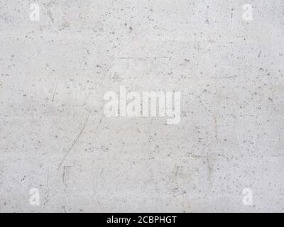 Construction and reconstruction. The background texture of the outer wall surface of a reinforced concrete slab of a residential building made of gray Stock Photo