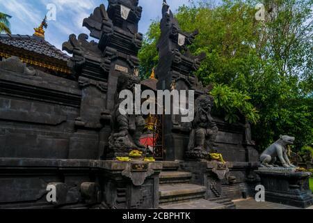Statues at the entrance of a hinduist temple in Bali, Indonesia Stock ...