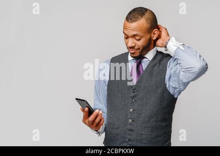 professional african-american business man holding mobile phone Stock Photo