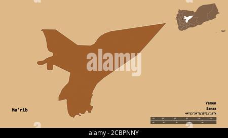 Shape of Ma'rib, governorate of Yemen, with its capital isolated on solid background. Distance scale, region preview and labels. Composition of patter Stock Photo