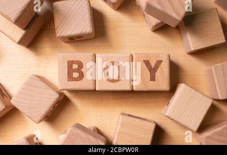 Word boy written with wooden cubes Stock Photo