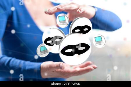Cyber attack concept between hands of a woman in background Stock Photo