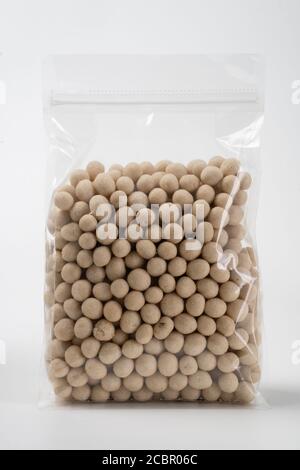 peanut product on blank plastic container Stock Photo