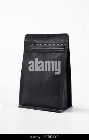 blank black standing pouch container over white background. product mockup Stock Photo