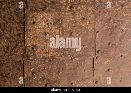 A Close Up Of A Series Of Rusty Metal Sheets Joined Together Stock Photo