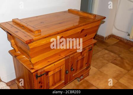 the ancient terracotta pot and wooden nestoli Stock Photo