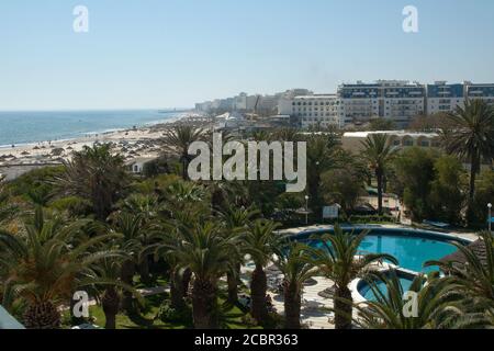 Sousse Tunisia, view over tourist resort pool and along coastline Stock Photo