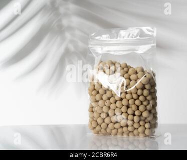 peanut product on blank plastic container Stock Photo