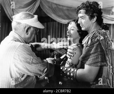 CECIL B. DeMILLE on set candid directing HEDY LAMARR and VICTOR MATURE in SAMSON AND DELILAH 1949 director CECIL B. DeMILLE Paramount Pictures Stock Photo