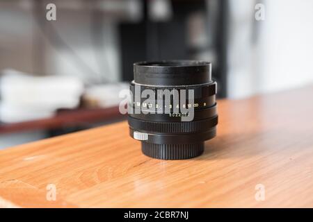 Helios 44-M used vintage lens close up. Wide aperture of f2. Made in the USSR, produces an unusual bokeh effect. Can be mounted on digital cameras. Stock Photo