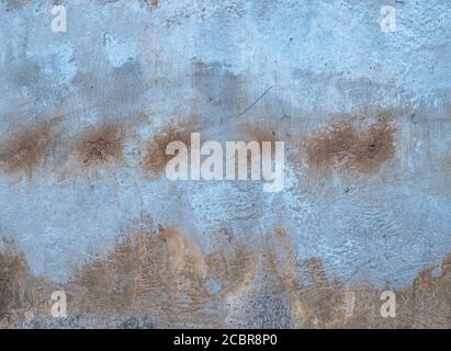 Rusty, grey, structured concrete wall surface background texture Stock Photo