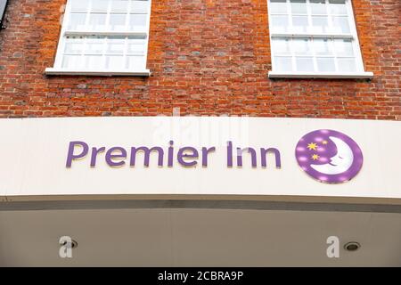 British hotel chain, Premier Inn. The logo of the company, a sleeping