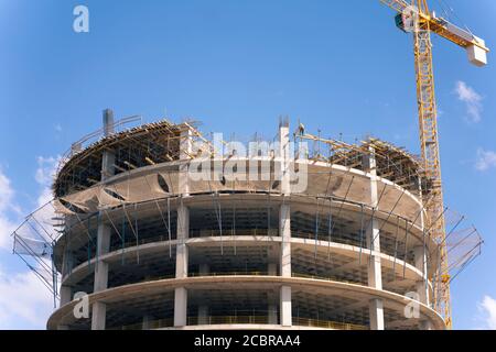 construction site and blue sky , structural steel beam build large residential buildings at construction site Stock Photo