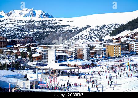 L'Alpe D'Huez , France 30.12.2019 Amazing winter landscape with snow covered mountain peaks. Winter sports. Alpine village surrounded by high mountains in winter. Ski resort in the french alps.  Stock Photo