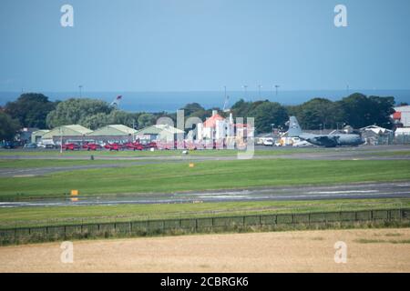 Prestwick, Scotland, UK. 15th Aug, 2020. Pictured: On the 75th Anniversary of VJ Day (Victory in Japan Day) celebrating the end of the Second World War the Royal Airforce (RAF) Red Arrows aerobatic display team are seen taking off from Prestwick International Airport, en route to Belfast for the next leg of their next flypast, ultimately ending in London later this evening for a flypast. Credit: Colin Fisher/Alamy Live News Stock Photo