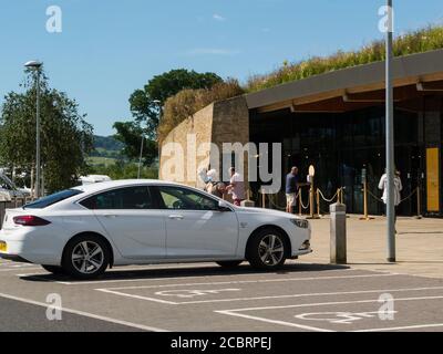 Visitors entering Farmshop Gloucester Service Station  Northbound on M5 motorway for comfort break Gloucester England UK Stock Photo