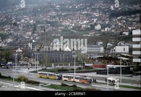 sarajevo tobacco factory 13th April 1994 During the Siege of Sarajevo: only recently running again,  a tram drives east, past French UNPROFOR soldiers on Vojvode Radomira  Putnika, past the ruins of the old tobacco factory