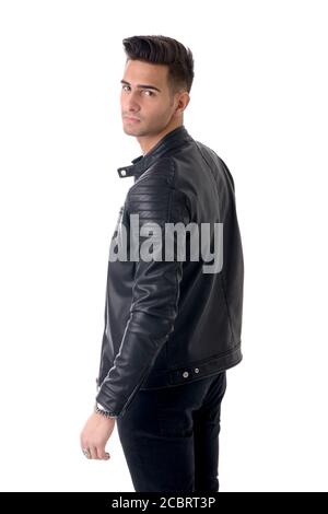 Young handsome man standing in studio shot Stock Photo