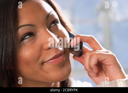 Young Pretty Woman Talking on her Cell Phone, USA Stock Photo