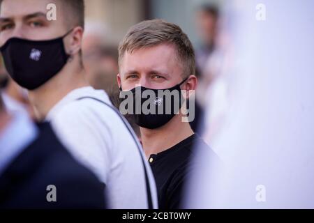 Warsaw, Pl. 15th Aug, 2020. Several hundred people are seen taking part in a march of the ultranaionatlist All Polish Youth (Mlodziez Wszechpolska) in Warsaw, Poland on August 15, 2020. The far-right and ultranationalist youth organisation organized a march on Saturday in light of the 100th anniversary of the Battle of Warsaw, the battle that turned the tide on the Bolshevik invasion of Europe. The All Polish Youth also oppose liberal values and oppose non-binary gender people who they see as a threat to Polish culture. (Photo by Jaap Arriens/Sipa USA) Credit: Sipa USA/Alamy Live News Stock Photo