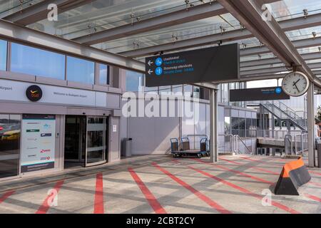 Budapest, Hungary - 08 15 2020: Entrance of the Ferenc Liszt International Airport in Budapest, Hungary on a summer day.